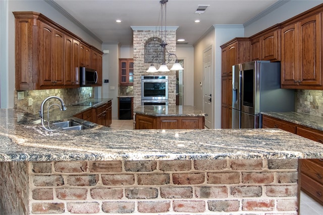 10111 Bluffview Cir, Pilot Point, TX 76258 - kitchen with appliances with stainless steel finishes, ornamental molding, tasteful backsplash, stone counters, and light tile patterned flooring