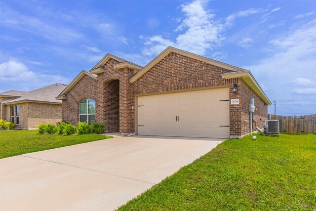 3008 Skinner Dr, Waco, TX 76655 - view of front of property featuring brick siding, an attached garage, and concrete driveway