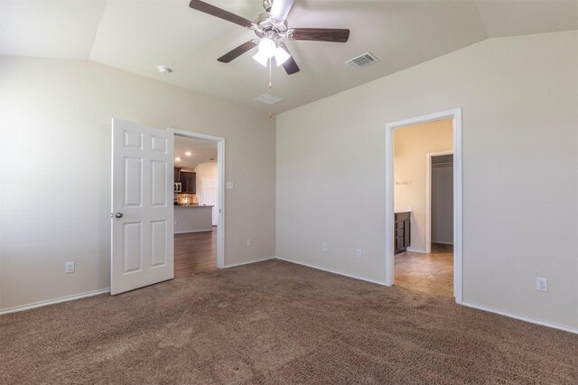 3008 Skinner Dr, Waco, TX 76655 - unfurnished bedroom with vaulted ceiling, carpet floors, and a ceiling fan