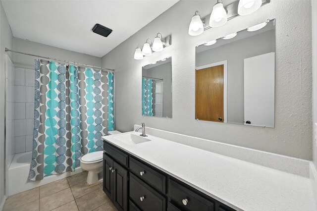 4603 Michelle Dr, Arlington, TX 76016 - bathroom with vanity, tile patterned flooring, and shower / tub combo with curtain