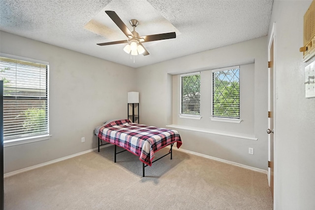 4603 Michelle Dr, Arlington, TX 76016 - bedroom featuring carpet, a textured ceiling, and ceiling fan