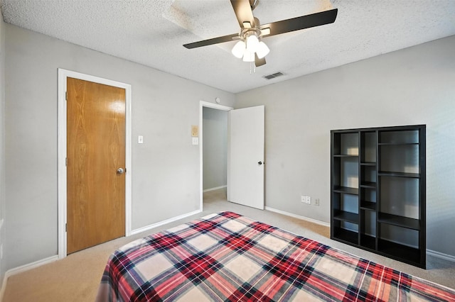 4603 Michelle Dr, Arlington, TX 76016 - bedroom with carpet floors, a textured ceiling, and ceiling fan