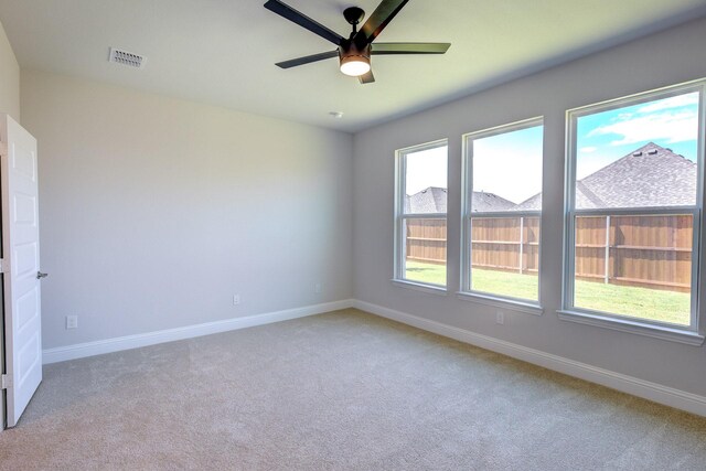 204 Savannah Ln, Oak Point, TX 75068 - unfurnished room with light carpet and a ceiling fan