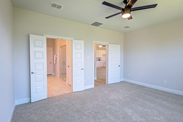 204 Savannah Ln, Oak Point, TX 75068 - unfurnished bedroom featuring light carpet and ceiling fan