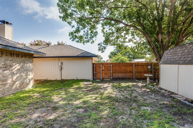 1608 Stroud Ln, Mesquite, TX 75150 - view of yard featuring a shed and a gate
