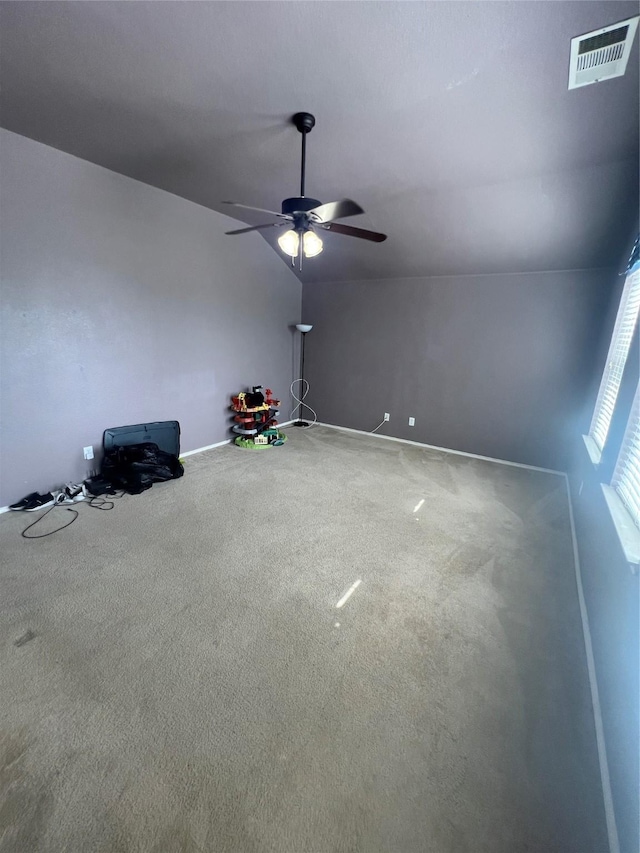 5901 Westgate Dr, Fort Worth, TX 76179 - spare room with carpet flooring, ceiling fan, and vaulted ceiling