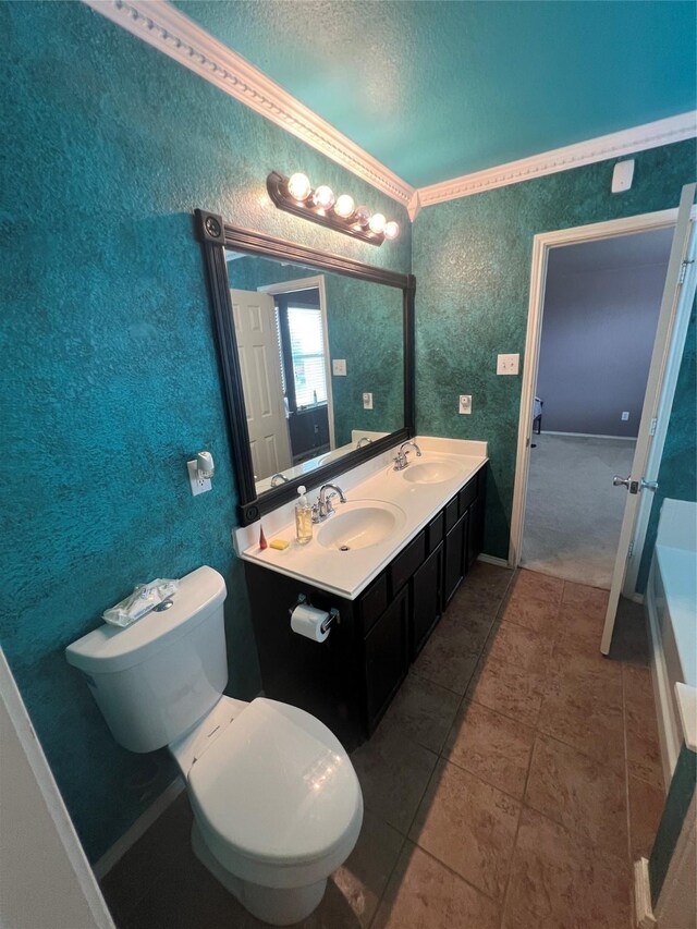 5901 Westgate Dr, Fort Worth, TX 76179 - bathroom with a textured ceiling, double vanity, crown molding, a textured wall, and tile patterned floors