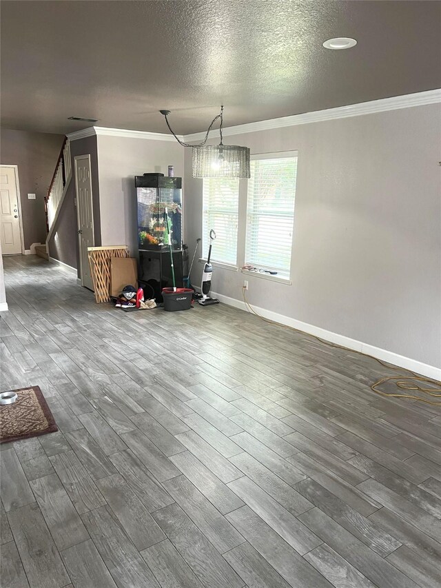 5901 Westgate Dr, Fort Worth, TX 76179 - interior space with ornamental molding, wood finished floors, stairs, and a textured ceiling