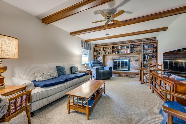 3256 Lancelot Dr, Dallas, TX 75229 - carpeted living room with beamed ceiling, a ceiling fan, and a fireplace