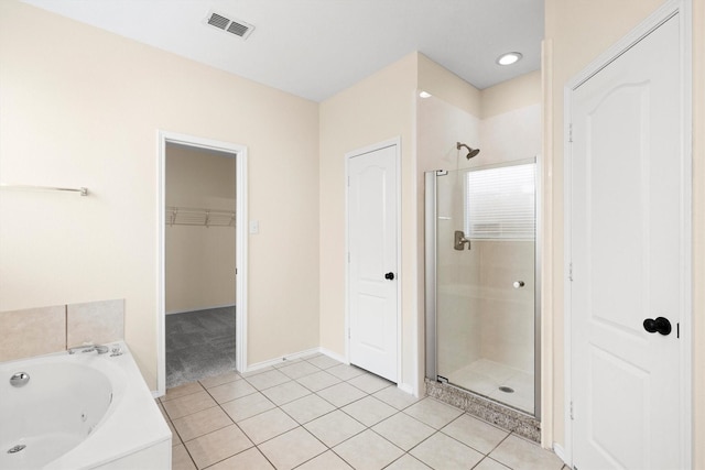 8516 Ontario Dr, Mckinney, TX 75072 - bathroom with a stall shower, a whirlpool tub, tile patterned floors, and a spacious closet