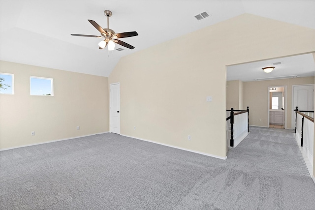 8516 Ontario Dr, Mckinney, TX 75072 - spare room with lofted ceiling, light colored carpet, and a ceiling fan