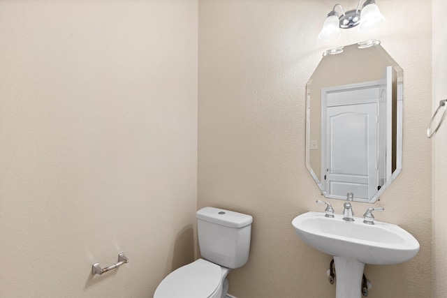 8516 Ontario Dr, Mckinney, TX 75072 - bathroom featuring toilet and a sink