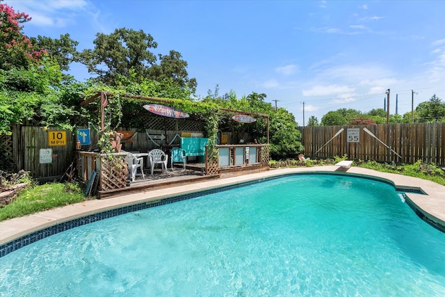 120 Woodland Ave, Corsicana, TX 75110 - view of pool with a fenced backyard and a diving board
