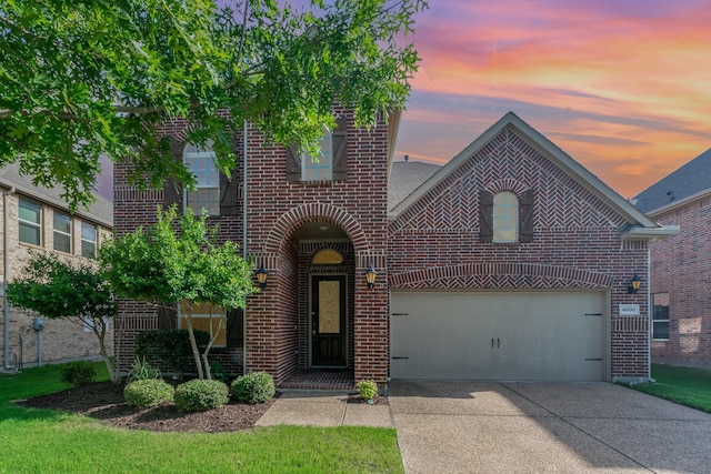 4600 Evenstar Way, Plano, TX 75074 - view of front of home with brick siding, driveway, and an attached garage