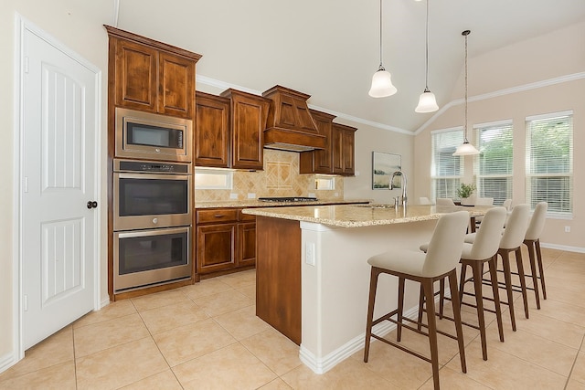 4600 Evenstar Way, Plano, TX 75074 - kitchen featuring custom range hood, stainless steel appliances, backsplash, light tile patterned floors, and a center island with sink