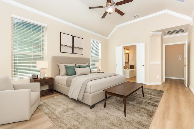 4600 Evenstar Way, Plano, TX 75074 - bedroom with light wood-style flooring, crown molding, multiple windows, lofted ceiling, and connected bathroom