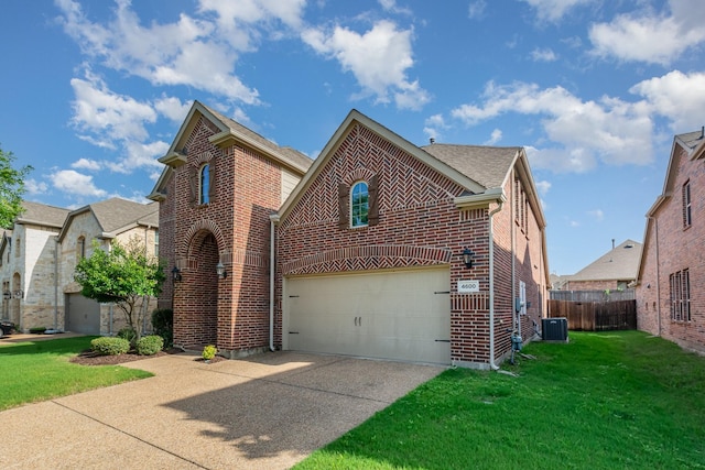 4600 Evenstar Way, Plano, TX 75074 - view of front of house with brick siding, concrete driveway, and a garage