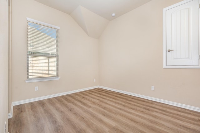 4600 Evenstar Way, Plano, TX 75074 - unfurnished room with plenty of natural light, light wood-style floors, and lofted ceiling