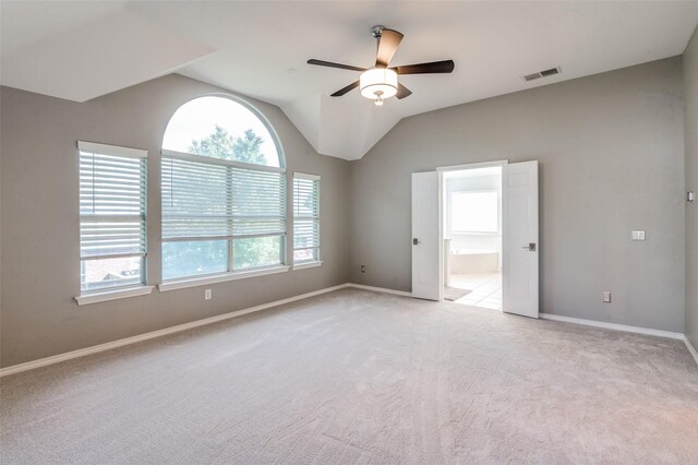 2400 Silverstone Ln, Mckinney, TX 75072 - empty room with light carpet, a ceiling fan, and lofted ceiling