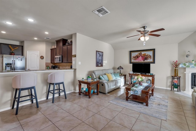 520 Rustic Oak Ln, Mckinney, TX 75072 - living area with recessed lighting, ceiling fan, and light tile patterned flooring