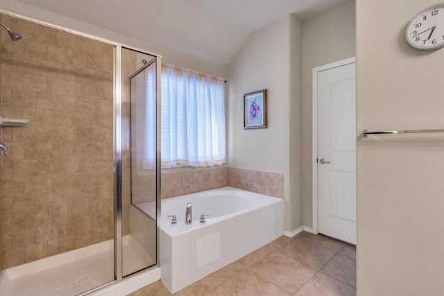 520 Rustic Oak Ln, Mckinney, TX 75072 - bathroom featuring a shower stall, a garden tub, tile patterned flooring, and lofted ceiling