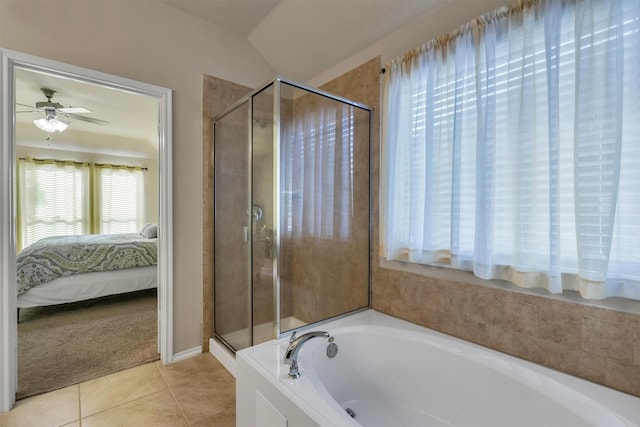 520 Rustic Oak Ln, Mckinney, TX 75072 - ensuite bathroom featuring a shower stall, a bath, tile patterned floors, a ceiling fan, and vaulted ceiling