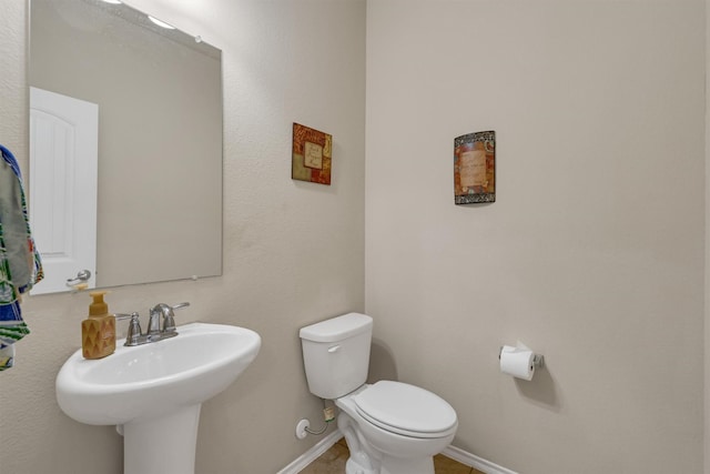 520 Rustic Oak Ln, Mckinney, TX 75072 - bathroom with toilet and baseboards