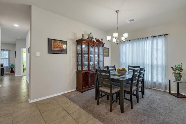 520 Rustic Oak Ln, Mckinney, TX 75072 - dining area with a chandelier and tile patterned flooring