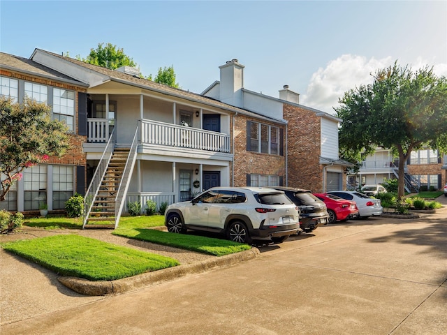 3101 Townbluff Dr Unit 922, Plano, TX 75075 - view of building exterior with stairway and driveway