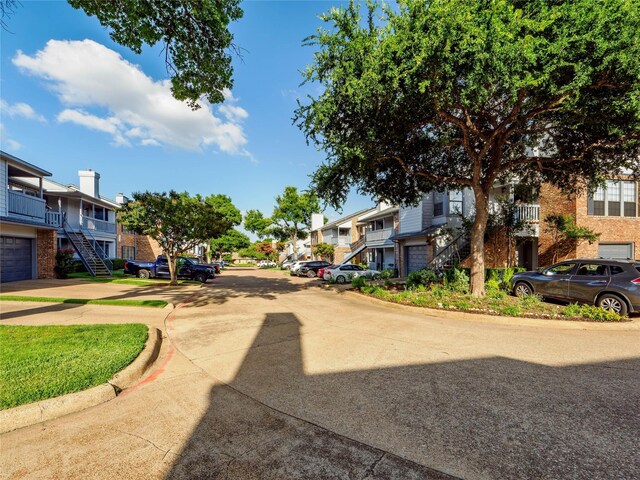 3101 Townbluff Dr Unit 922, Plano, TX 75075 - view of road featuring curbs, stairway, and a residential view