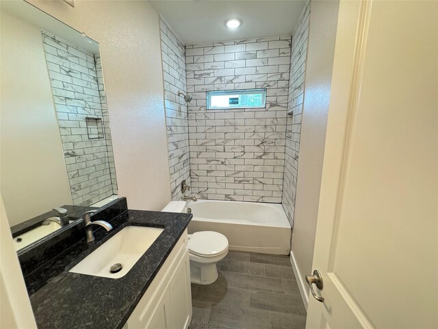 500 Ennis Scott St, Ferris, TX 75125 - bathroom with vanity,  shower combination, and recessed lighting
