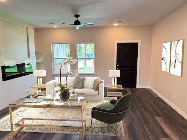 500 Ennis Scott St, Ferris, TX 75125 - living area featuring a ceiling fan, dark wood finished floors, and recessed lighting