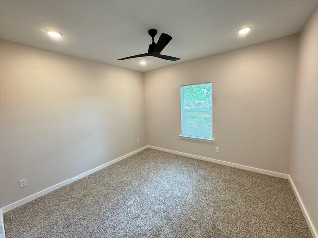 500 Ennis Scott St, Ferris, TX 75125 - carpeted spare room with a ceiling fan and recessed lighting