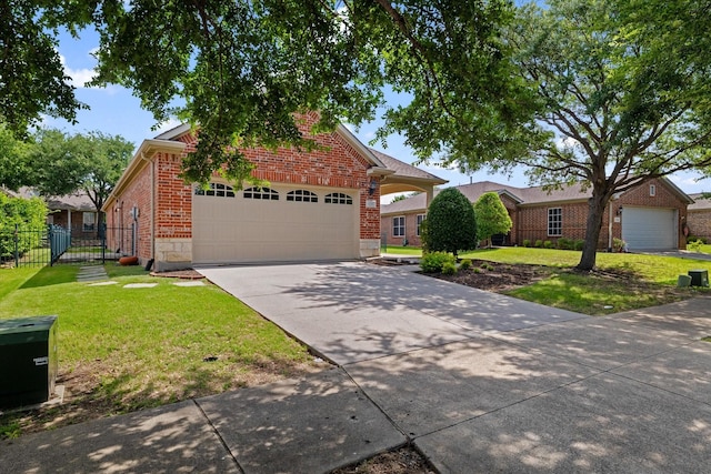 626 Oakland Hills Ln, Frisco, TX 75036 - view of front of home with brick siding, driveway, and a garage