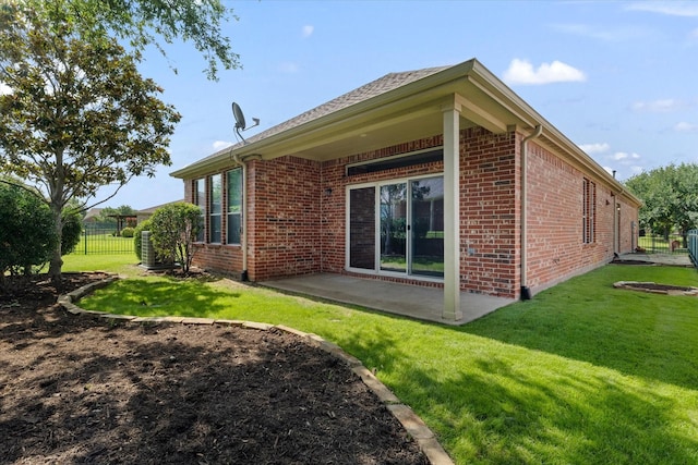 626 Oakland Hills Ln, Frisco, TX 75036 - back of house with brick siding and a patio