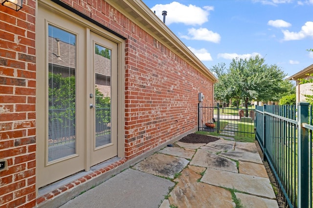 626 Oakland Hills Ln, Frisco, TX 75036 - doorway to property featuring brick siding