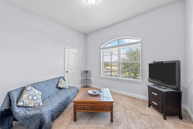 2209 Therese Dr, Waco, TX 76712 - living area featuring baseboards and light colored carpet