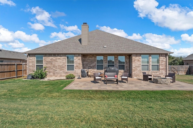 2209 Therese Dr, Waco, TX 76712 - back of property featuring outdoor lounge area, a patio area, a fenced backyard, and brick siding