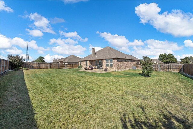 2209 Therese Dr, Waco, TX 76712 - fenced backyard with a patio