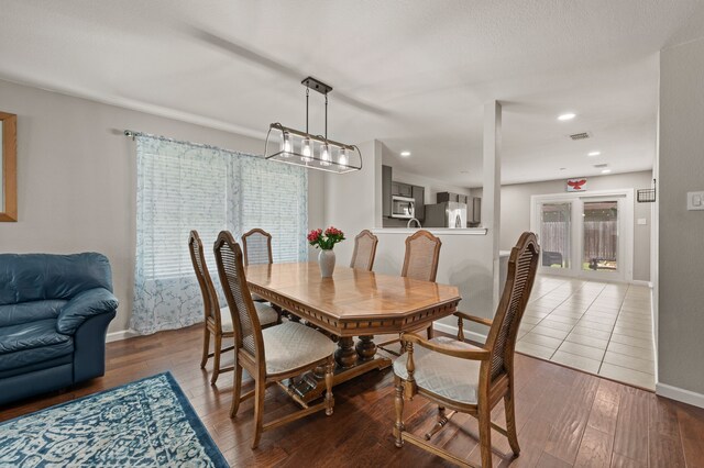 4505 Martingale View Ln, Fort Worth, TX 76244 - dining room with plenty of natural light, wood finished floors, and recessed lighting