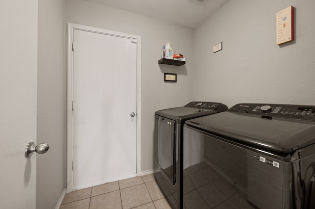 4505 Martingale View Ln, Fort Worth, TX 76244 - laundry room with separate washer and dryer and light tile patterned floors