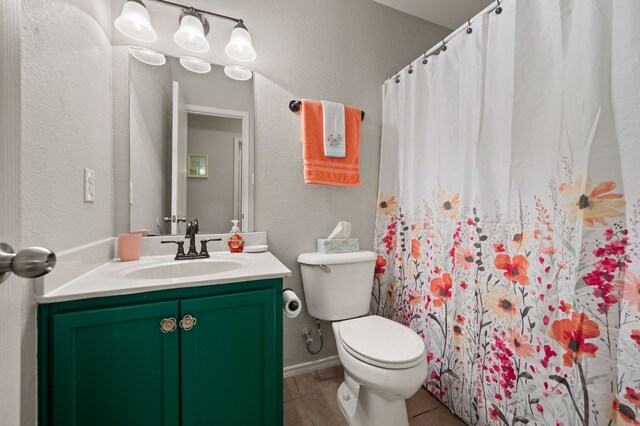 4505 Martingale View Ln, Fort Worth, TX 76244 - full bathroom featuring vanity, tile patterned floors, a textured wall, and curtained shower