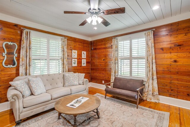 501 W Parks Ave, Waxahachie, TX 75165 - living room with ceiling fan, wood finished floors, ornamental molding, wooden walls, and recessed lighting