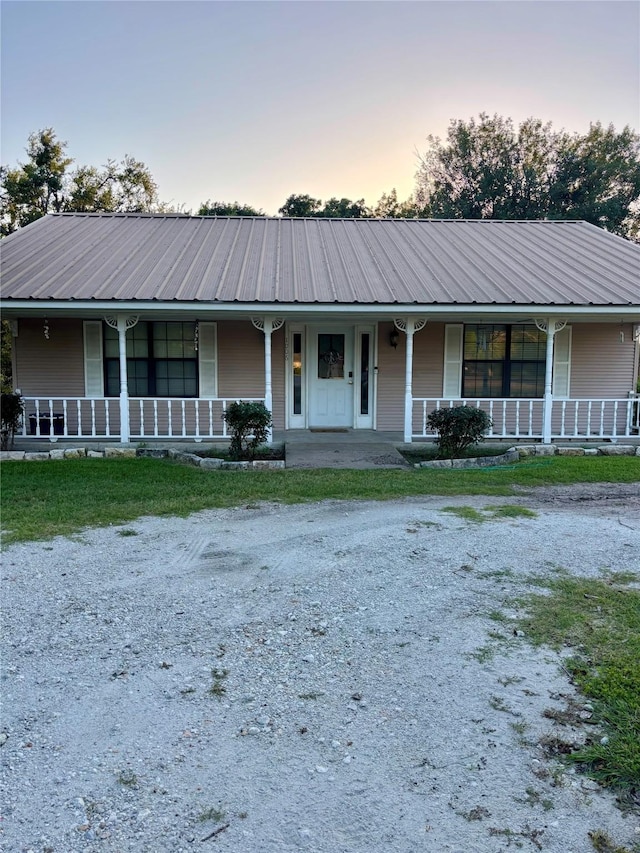 1006 S State Highway 14, Thornton, TX 76687 - view of front of home with a porch and a metal roof