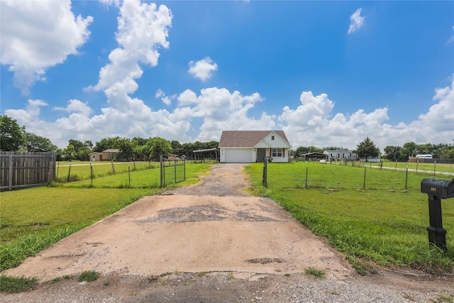 392 Calle Cedro Dr, Sherman, TX 75090 - view of dirt / gravel driveway with a gated entry and a rural view