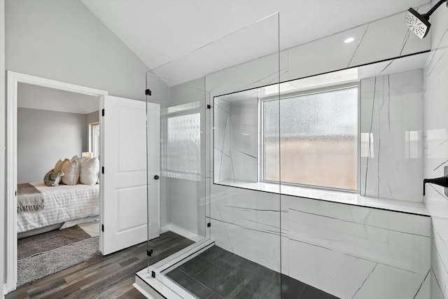 6604 Kingsferry Ct, Arlington, TX 76016 - bathroom with a shower stall, vaulted ceiling, wood finished floors, and ensuite bathroom