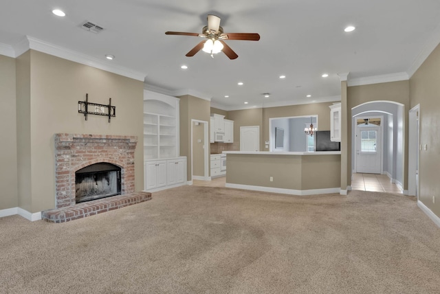 245 Harders Crossing Blvd, Shreveport, LA 71106 - unfurnished living room featuring light carpet, ceiling fan, a brick fireplace, crown molding, and recessed lighting