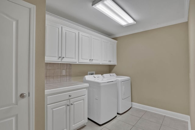 245 Harders Crossing Blvd, Shreveport, LA 71106 - washroom featuring cabinet space, independent washer and dryer, light tile patterned floors, and ornamental molding