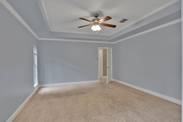 245 Harders Crossing Blvd, Shreveport, LA 71106 - empty room with ceiling fan, a tray ceiling, light colored carpet, and crown molding