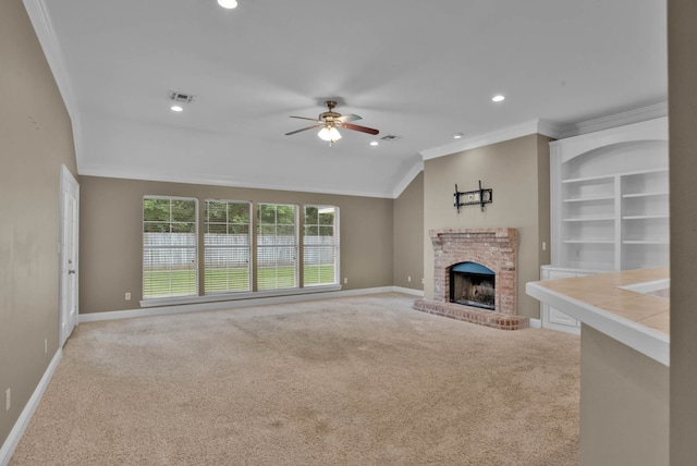245 Harders Crossing Blvd, Shreveport, LA 71106 - unfurnished living room with crown molding, a ceiling fan, light carpet, recessed lighting, and a brick fireplace